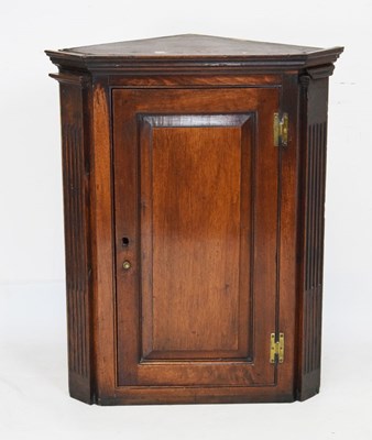 Lot 703 - 18th Century oak hanging corner cupboard