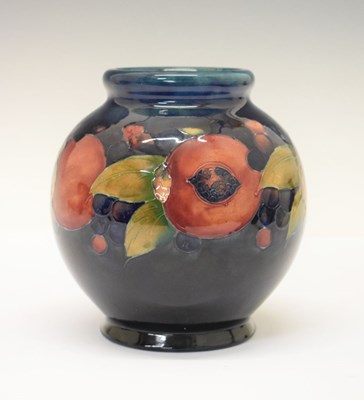 Lot 391 - William Moorcroft pottery Pomegranate pattern spherical vase