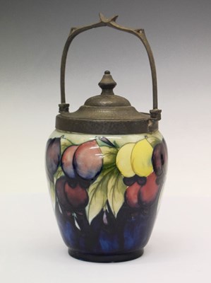 Lot 395 - William Moorcroft 'Wisteria' biscuit barrel