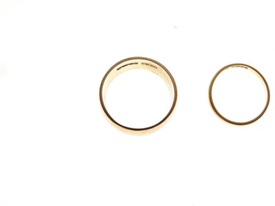 Lot 34 - Two 22ct gold wedding bands