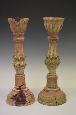 Lot 536 - Pair of carved wooden candlesticks