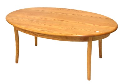 Lot 727 - Ercol Golden Dawn oval coffee table