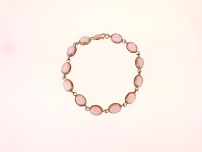 Lot 29 - Twelve-stone opal bracelet