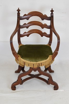 Lot 539 - Late 19th Century walnut 'X' framed open armchair