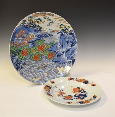 Lot 255 - Japanese charger with landscape decoration and an Imari plate