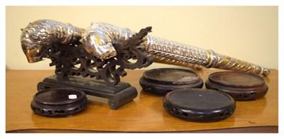 Lot 293 - Pair of Indian lion headed metal staffs and quantity of carved hardwood stands