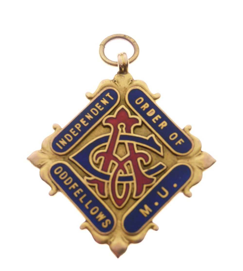 Lot 30 - 9ct gold and enamel decorated Oddfellows diamond form medal