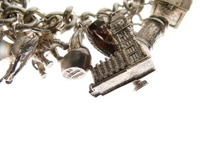 Lot 54 - Silver charm bracelet
