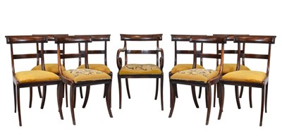 Lot 704 - Set of nine Regency mahogany sabre-leg dining chairs (8+1)