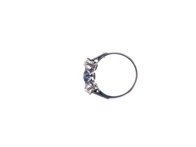 Lot 17 - Sapphire and diamond three-stone ring