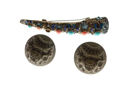 Lot 45 - Chinese fingernail guard as a brooch, and pair of Italian lava stone buttons