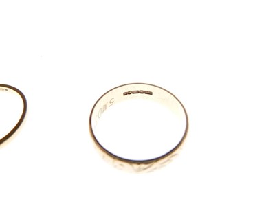 Lot 11 - 9ct gold foliate-engraved wedding band