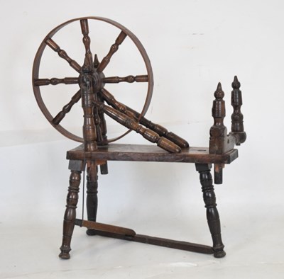 Lot 515 - 17th Century fruitwood spinning wheel