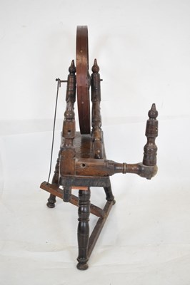 Lot 515 - 17th Century fruitwood spinning wheel