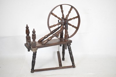 Lot 515 - 17th Century fruitwood spinning wheel