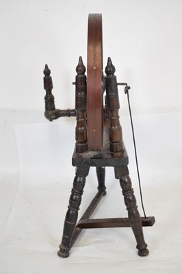 Lot 515 - 17th Century fruitwood spinning wheel