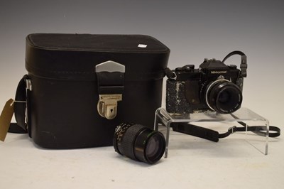 Lot 297 - FT2 Nikkormat and two lenses, cased