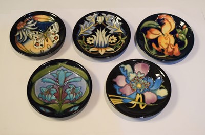 Lot 298 - Moorcroft Pottery - Five pin dishes