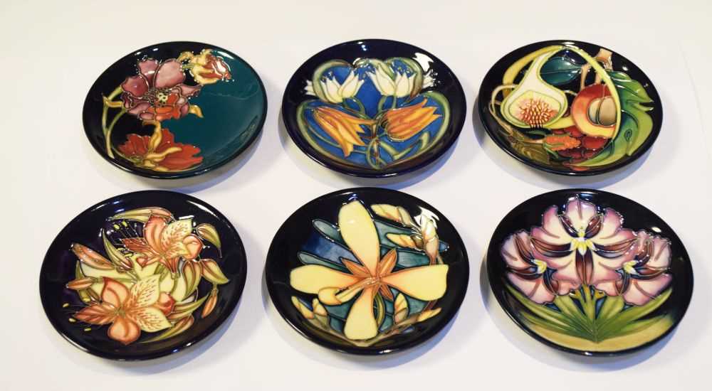 Lot 297 - Moorcroft Pottery - Six pin dishes