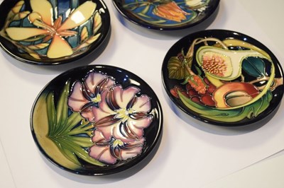 Lot 297 - Moorcroft Pottery - Six pin dishes