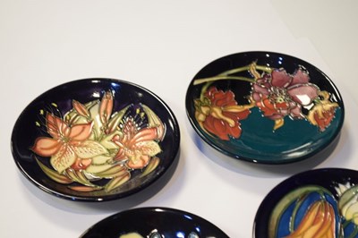 Lot 297 - Moorcroft Pottery - Six pin dishes