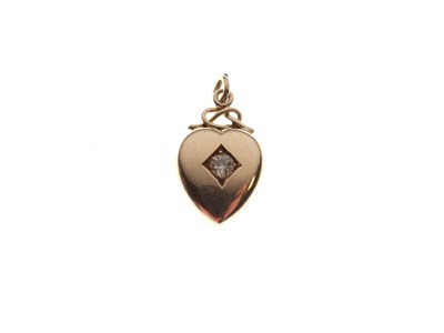 Lot 24 - Yellow metal heart-pendant pendant