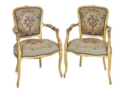 Lot 703 - Pair of early 20th Century giltwood open armchairs or fauteuils