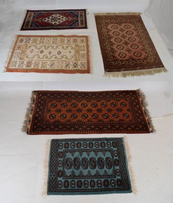 Lot 415 - Five small Middle Eastern style rugs