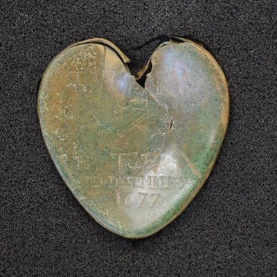 Lot 274 - Group of archaeological finds including heart-shaped casket