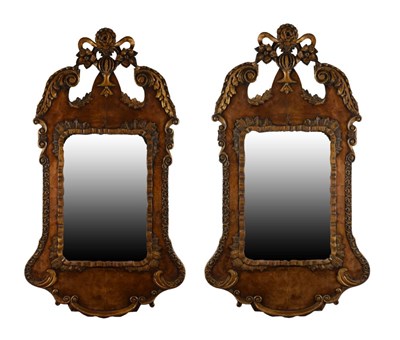 Lot 664 - Pair of early 20th Century George I style walnut and parcel gilt mirrors