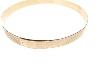 Lot 15 - 9ct gold expanding bangle, and a rolled gold bangle