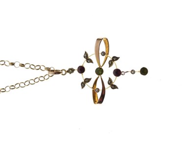 Lot 23 - Edwardian peridot, garnet and seed pearl pendant on chain