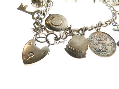 Lot 55 - Silver charm bracelet, and an unmarked St Christopher on silver chain