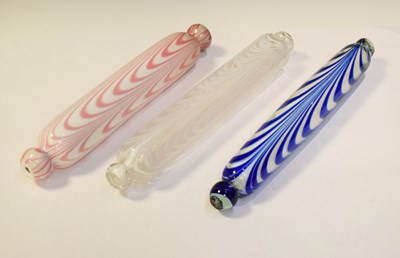 Lot 327 - Three Victorian Nailsea-type glass rolling pins