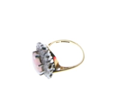 Lot 26 - Opal and diamond 18ct gold cluster ring