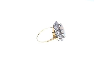 Lot 26 - Opal and diamond 18ct gold cluster ring