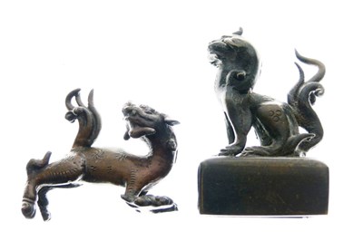 Lot 320 - Two Chinese bronze miniature Dogs of Fo