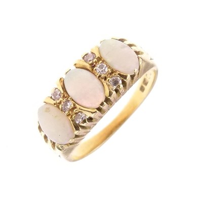 Lot 24 - Opal and diamond 18ct gold ring