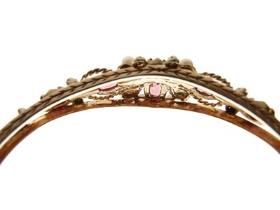 Lot 32 - 9ct gold garnet and cultured pearl hinged bangle