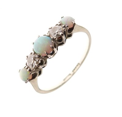 Lot 33 - Opal and diamond five-stone ring