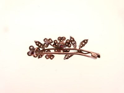 Lot 43 - Late Victorian diamond and ruby naturalistic floral brooch