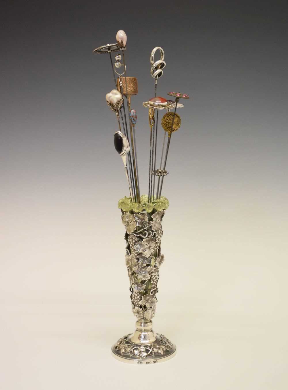 Lot 115 - Victorian silver vase with thirteen hat pins