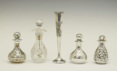 Lot 119 - Four scent bottles and posy vase