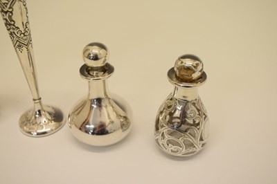 Lot 119 - Four scent bottles and posy vase
