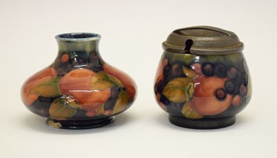 Lot 392 - William Moorcroft 'Pomegranate' vase and jar