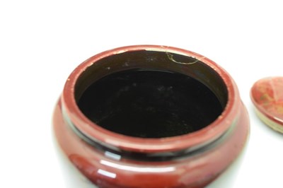 Lot 412 - Bernard Moore flambé jar and cover