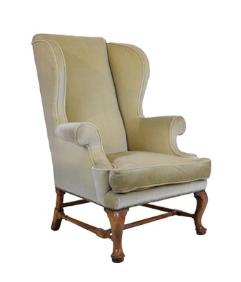 Lot 700 - George III style wing back armchair