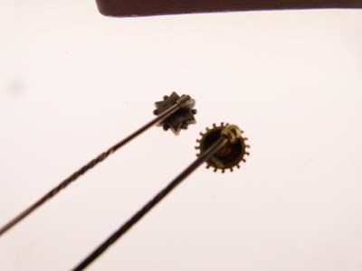 Lot 48 - Two diamond set stick pins