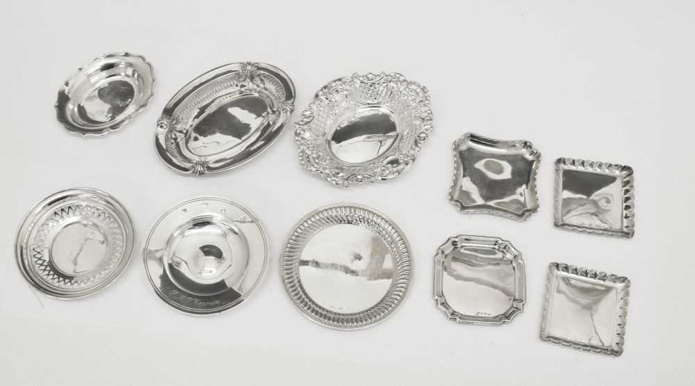 Lot 195 - Ten silver dishes and coasters
