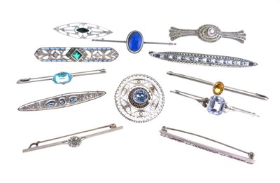 Lot 71 - Twelve silver and white metal stone set brooches